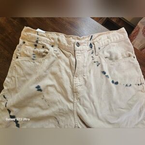 Levi Strauss & Co. 569 style, mens demin Jean shorts. Peach color W black tiedye